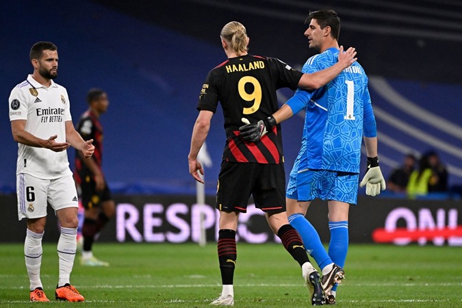 Haaland and put Courtois on the shoulder.  Photo: Getty